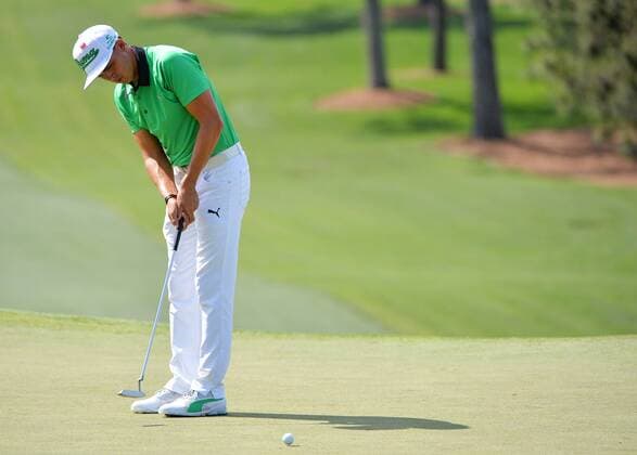 Rickey Fowler putts on the 7th hole in the first round the 2015 Masters Tournament at Augusta National Golf Club in Augusta, Georgia on April 9, 2015.  MAS20150409194 KEVINxDIETSCH