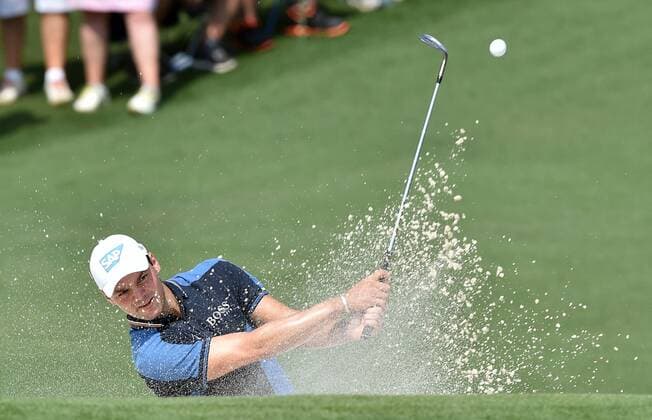 April 9, 2015 - Augusta, GA, USA - Martin Kaymer chips out of the bunker on 2 during the first round at the Masters Golf Tournament, Thursday, April 9, 2015 in Augusta, Ga. Masters golf - ZUMAm67_