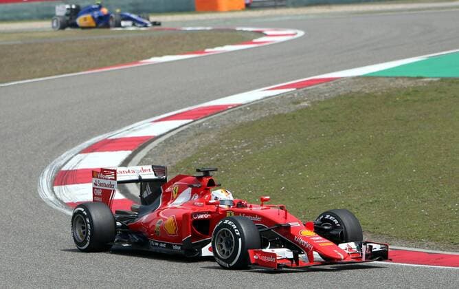 (150410) -- SHANGHAI, April 10, 2015 -- Ferrari s German driver Sebastian Vettel drives his car during the first practice session of the Formula One Chinese Grand Prix in Shanghai, east China, April 10, 2015. ) (SP)CHINA-SHANGHAI-F1-PRACTICE FanxJun 