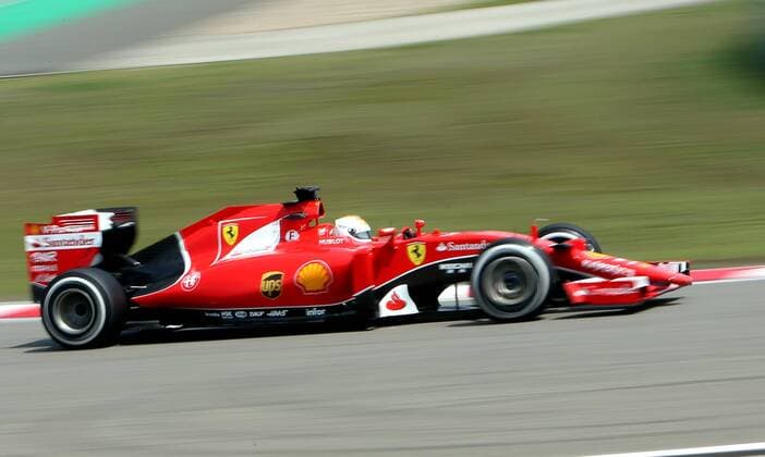 (150410) -- SHANGHAI, April 10, 2015 -- Ferrari s German driver Sebastian Vettel drives his car during the first practice session of the Formula One Chinese Grand Prix in Shanghai, east China, April 10, 2015. ) (SP)CHINA-SHANGHAI-F1-PRACTICE FanxJun 