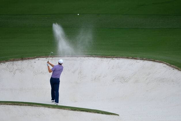 Jordan Spieth hits out of a fairway bunker on the 8th hole in the second round of the 2015 Masters Tournament at Augusta National Golf Club in Augusta, Georgia on April 10, 2015.  AUG20150410137 KEVINxDIETSCH