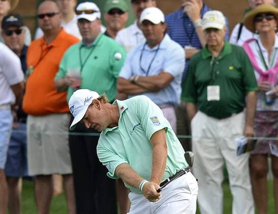 April 10, 2015 - Augusta, GA, USA - Ernie Els chips his ball onto the second green at Augusta National Golf Club during second round action in the Masters on Friday, April 10, 2015 in Augusta, Fla. Masters Day 2 - ZUMAm67_