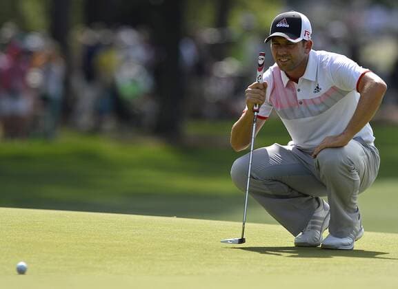 April 10, 2015 - Augusta, Georgia, U.S. - SERGIO GARCIA lines up a putt on the first green at Augusta National Golf Club during second round action in the Masters on Friday. Golf 2015 - Masters Tournament - Round 2 - ZUMAm67_