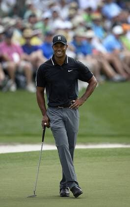 April 10, 2015 - Augusta, Georgia, U.S. - TIGER WOODS smiles as he waits to putt on the 16th green during second round action of the Masters at Augusta National Golf Club on Friday. Woods finished the round at -2. Golf 2015 - Masters Tournament - Round 2 - ZUMAm67_