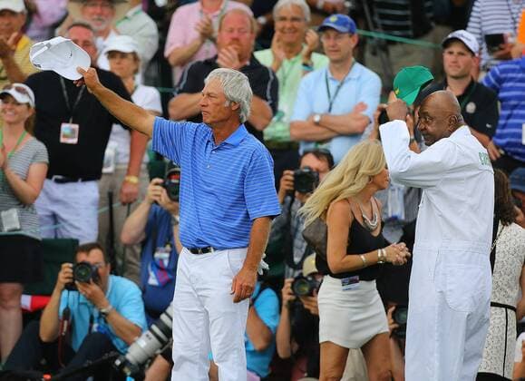 April 10, 2015 - Augusta, GA, USA - Ben Crenshaw and his long-time caddy Carl Jackson both tip their caps to the gallery as Crenshaw completes his final round at the Masters at Augusta National Golf Club on Friday, April 10, 2015, in Augusta, Ga. Jackson was unable to caddie for Crenshaw this week due to medical issues. Masters day 2 - ZUMAm67_