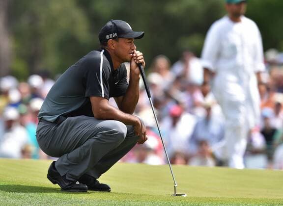 April 10, 2015 - Augusta, GA, USA - Tiger Woods lines up a birdie attempt on the 7th green during the second round of the Masters at Augusta National Golf Club on Friday, April 10, 2015, in Augusta, Ga. Masters day 2 - ZUMAm67_