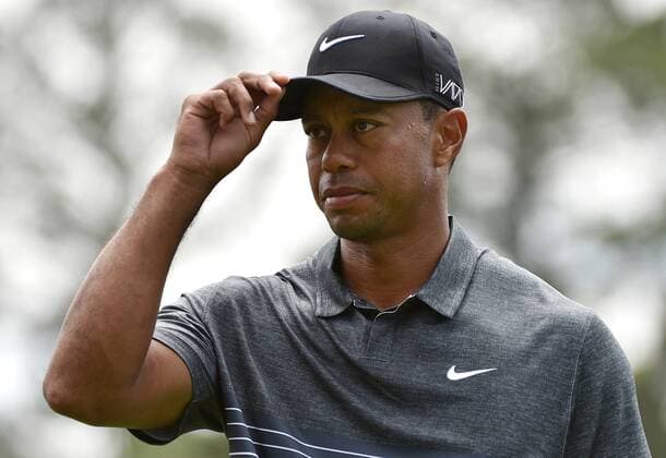 Tiger Woods stands on the 1st tee box in the third round of the 2015 Masters Tournament at Augusta National Golf Club in Augusta, Georgia on April 11, 2015.  AUG20150411105 KEVINxDIETSCH