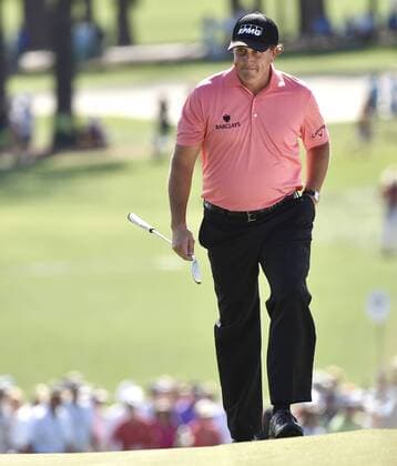 Phil Mickelson walks on the 9th green before making a putt for birdie in the third round of the 2015 Masters Tournament at Augusta National Golf Club in Augusta, Georgia on April 11, 2015.  AUG20150411120 KEVINxDIETSCH