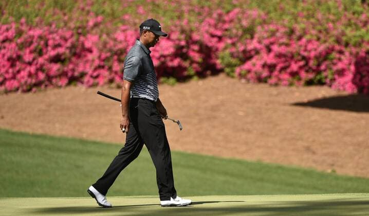 Tiger Woods walks off of the 10th green in the third round of the 2015 Masters Tournament at Augusta National Golf Club in Augusta, Georgia on April 11, 2015.  AUG20150411127A KEVINxDIETSCH