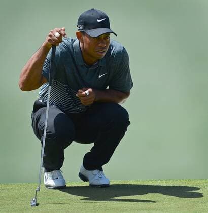 April 11, 2015 - Augusta, GA, USA - Tiger Woods lines up a putt on the 7th green during the third round of the Masters at Augusta National Golf Club on Saturday, April 11, 2015, in Augusta, Ga. The Masters, Day 3 - ZUMAm67_