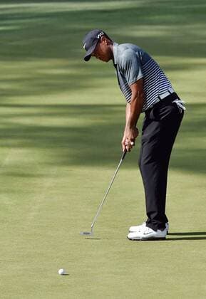 April 11, 2015 - Augusta, GA, USA - Tiger Woods putts on the 15th green during the third round of the Masters at Augusta National Golf Club on Saturday, April 11, 2015, in Augusta, Ga. The Masters, Day 3 - ZUMAm67_