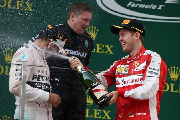 12.04.2015 - Race, Lewis Hamilton (GBR) Mercedes AMG F1 W06 race winner and 3rd position Sebastian Vettel (GER) Scuderia Ferrari SF15-T Chinese Grand Prix, Shanghai 09 - 12 April 2015 