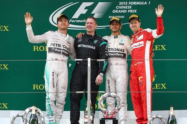 Germany s Nico Rosberg, left, and Britain s Lewis Hamilton, second right, of Mercedes, Germany s Sebastian Vettel of Ferrari, right, pose during the award ceremony of the 2015 Formula 1 Chinese Grand Prix at the Shanghai International Circuit in Shanghai, China, 12 April 2015. Lewis Hamilton put Mercedes back on top in Formula One, leading for most of the race on Sunday (12 April 2015) to capture his fourth Chinese Grand Prix victory. Hamilton made sure there would be no repeat of Ferrari s surprising win two weeks ago at the Malaysian Grand Prix, conserving his tires to withstand a challenge by the Italian team s Sebastian Vettel and easily capture the 35th win of his career. Hamilton s Mercedes teammate Nico Rosberg finished second and Vettel was third. Lewis Hamilton wins 4th Chinese Grand Prix  pbu258197_04