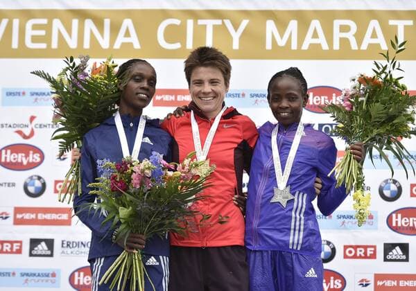 ATHLETICS - VCM 2015 VIENNA,AUSTRIA,12.APR.15 - ATHLETICS, RUNNING - Vienna City Marathon, award ceremony. Image shows Esther Chemtai (KEN), Maja Neuenschwander (SUI) and Agnes Mutune (KEN). GEPAxpictures xM.xHoermandinger 