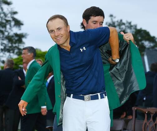 April 12, 2015 - Augusta, Georgia, U.S. - BUBBA WATSON Watson helps tournament winner JORDAN SPIETH put on his green jacket after Spieth won The Masters at Augusta National Golf Club. Golf 2015 - The Masters - Spieth Wins - ZUMAm67_