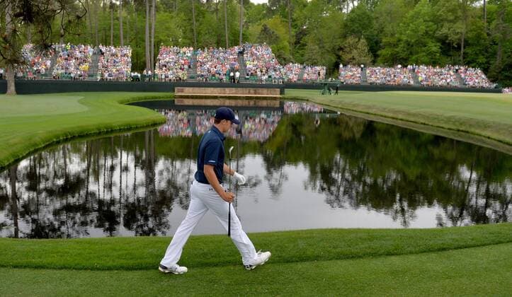 April 12, 2015 - Augusta, GA, USA - Jordan Spieth walks past the pond at the 15th green en route to winning the 2015 Masters on Sunday, April 12, 2015, at Augusta National Golf Club in Augusta, Ga. Masters final round - ZUMAm67_