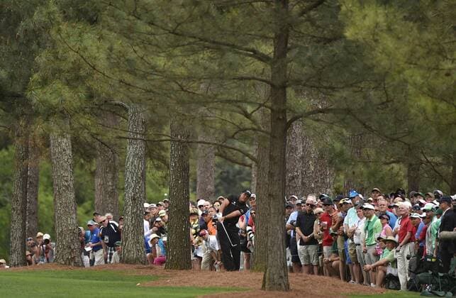 Phil Mickelson hits out of the rough on the first hole in the final round of the 2015 Masters Tournament at Augusta National Golf Club in Augusta, Georgia on April 12, 2015.  AUG20150412119 KEVINxDIETSCH