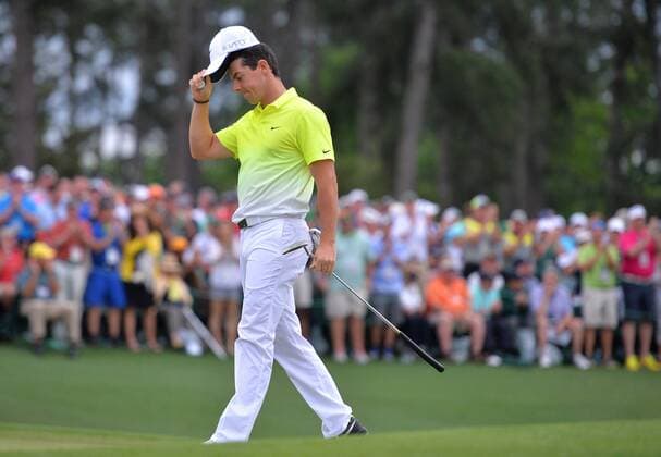 Rory McIlroy tips his hat on the 18th green after the final round at the 2015 Masters Tournament at Augusta National Golf Club in Augusta, Georgia on April 12, 2015. Jordan Spieth won the 2015 Masters Tournament and it is his first major championship win with a score of 18 under par.  AUG20150412159 KEVINxDIETSCH