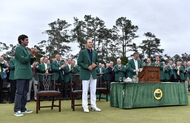 2014 Masters champion Bubba Watson and 2015 champion Jordan Spieth stand wearing their Green Jackets after Spieth wins the 2015 Masters Tournament at Augusta National Golf Club in Augusta, Georgia on April 12, 2015. Jordan Spieth wins his first major championship with a score of 18 under par.  AUG20150412169 KEVINxDIETSCH