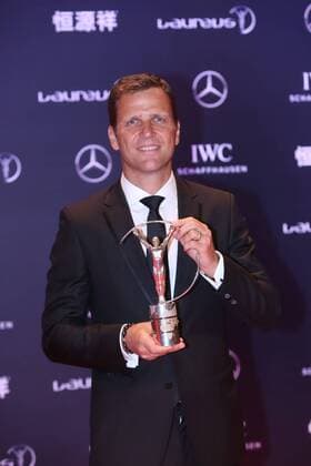 Retired German football star Oliver Bierhoff poses with the trophy after the award ceremony for the Laureus World Sports Awards Shanghai 2015 in Shanghai, China, 15 April 2015. Germany s World Cup-winning national squad won the team of the year prize at the Laureus Sports Awards on Wednesday (15 April 2015). Germany beat Argentina 1-0 in last year s final in Brazil to win its fourth World Cup title and first in 24 years. The German team was picked for the Laureus award over Mercedes Formula One-winning team, the NBA Basketball Herren USA champion San Antonio Spurs, the Davis Cup-winning Swiss team, the European Ryder Cup-winning team, and Real Madrid, winners of the Champions League title. The Laureus Awards were held for the first time in China and brought out many of the country s top sports stars, including a heavily pregnant tennis player Li Na, basketball player Yao Ming and former Olympic champion hurdler Liu Xiang. Germany s World Cup team wins Laureus team award  20150415_30639