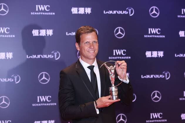 Retired German football star Oliver Bierhoff poses with the trophy after the award ceremony for the Laureus World Sports Awards Shanghai 2015 in Shanghai, China, 15 April 2015. Germany s World Cup-winning national squad won the team of the year prize at the Laureus Sports Awards on Wednesday (15 April 2015). Germany beat Argentina 1-0 in last year s final in Brazil to win its fourth World Cup title and first in 24 years. The German team was picked for the Laureus award over Mercedes Formula One-winning team, the NBA Basketball Herren USA champion San Antonio Spurs, the Davis Cup-winning Swiss team, the European Ryder Cup-winning team, and Real Madrid, winners of the Champions League title. The Laureus Awards were held for the first time in China and brought out many of the country s top sports stars, including a heavily pregnant tennis player Li Na, basketball player Yao Ming and former Olympic champion hurdler Liu Xiang. Germany s World Cup team wins Laureus team award  20150415_44906