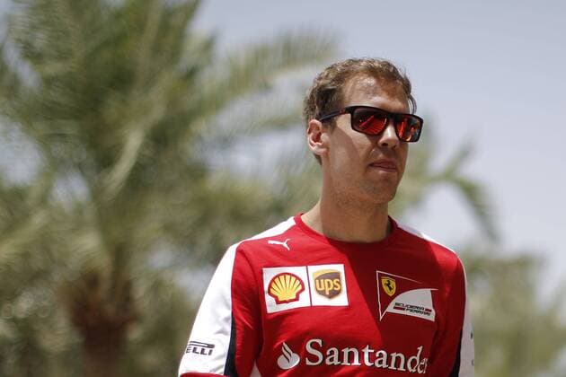 April 16, 2015 - Sakhir, Kingdom of Bahrain - SEBASTIAN VETTEL of Germany and Scuderia Ferrari is seen in the paddock during preparations to the 2015 Formula 1 Bahrain Grand Prix at Bahrain International Circuit in Sakhir, Kingdom of Bahrain. F1 2015 - Bahrain Grand Prix - Preparations - ZUMAg147