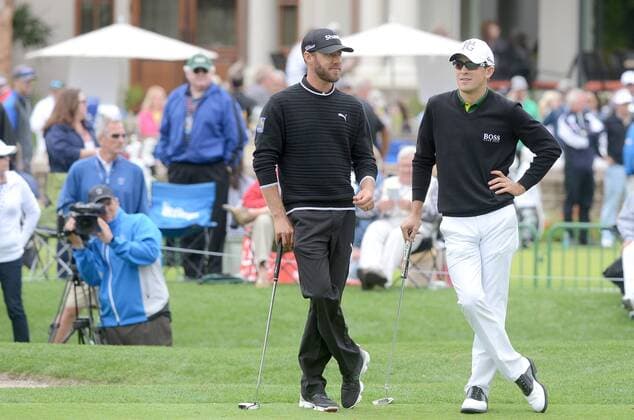 April 16, 2015 - Hilton Head Island, SC, USA - Graham DeLaet, left, and Scott Langley wait as Jeff Overton putts his ball on the 9th hole during the first round of the RBC Heritage Presented by Boeing on Thursday, April 16, 2015, at Harbour Town Golf Links in Sea Pines on Hilton Head Island, S.C. RBC Heritage Presented by Boeing - ZUMAm67_