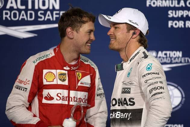 18.04.2015 - Qualifying, 2nd position Sebastian Vettel (GER) Scuderia Ferrari SF15-T and 3rd position Nico Rosberg (GER) Mercedes AMG F1 W06 Bahrain Grand Prix, Sakhir 16 - 19 April 2015 