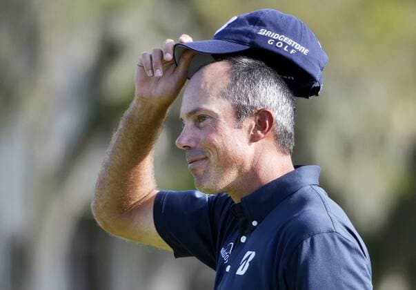 April 18, 2015 - Hilton Head Island, SC, USA - Defending champion Matt Kuchar salutes the crowd with a tip of his hat after putting out on the 18th green during the third round of the RBC Heritage Presented by Boeing on Saturday, April 18, 2015, at Harbour Town Golf Links on Hilton Head Island, S.C. HeritaRBC Heritage Presented by Boeing, third round - ZUMAm67_