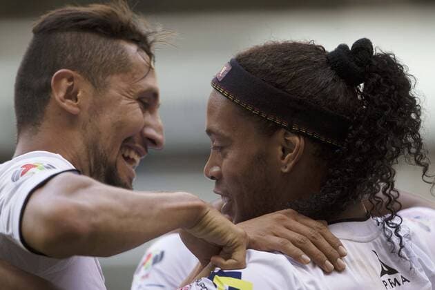 MEXICO CITY, April 18, 2015 -- Queretaro s Ronaldinho (R) celebrates his score during the match corresponding to the Day 14 of the 2015 Closing Tournament of the MX League against America, held in Azteca Stadium in Mexico City, capital of Mexico, April 18, 2015. Alejandro Ayala) (da) (SP)MEXICO-MEXICO CITY-SOCCER-AMERICA VS QUERETARO e AlejandroxAyala 