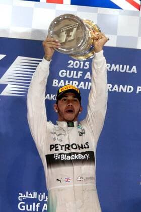 FORMULA 1 - Bahrain GP SAKHIR,BAHRAIN,19.APR.15 - MOTORSPORTS, FORMULA 1 - Grand Prix of Bahrain, Bahrain International Circuit, award ceremony. Image shows Lewis Hamilton (GBR Mercedes GP) with the trophy. GEPAxpictures xFritzxMueller 
