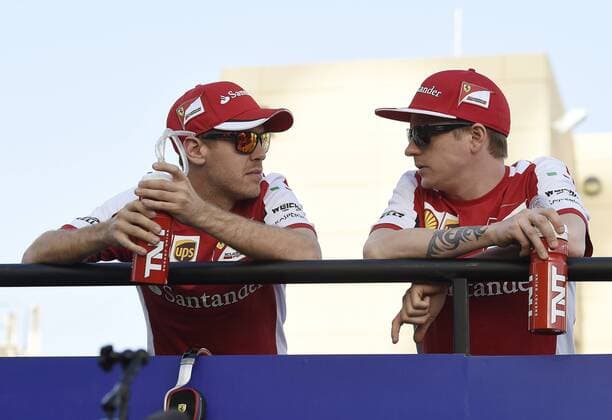 VETTEL Sebastian Team Scuderia Ferrari im Fahrerlager mit RAIKKONEN Kimi Formel 1 GP von Bahrain 2015 am 19.April 2015 in Manama 