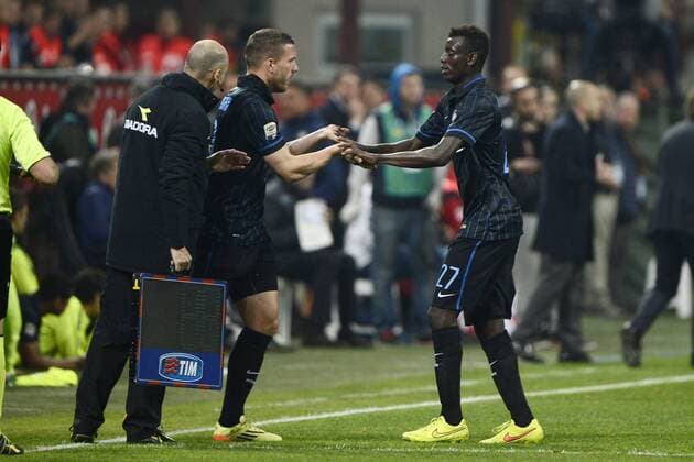 Lukas Podolski, Assane Demoya Gnoukouri inter - Mailand, 25-04-2015 Stadio Giuseppe Meazza - Football Calcio Serie A Inter Mailand vs AS Rom giuseppexceleste