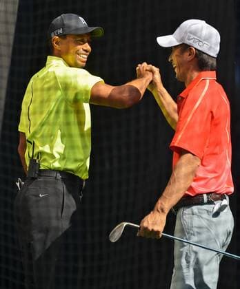 Tiger Woods shakes hand with Japanese amature golfer during an event for Nike, Inc. in Tokyo, Japan, on April 26, 2015.  TKP2015042618 KEIZOxMORI