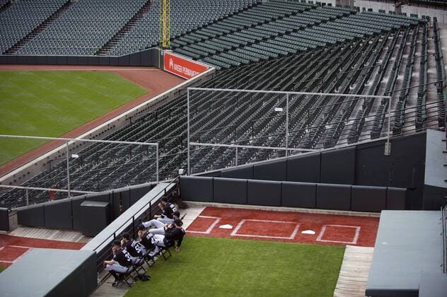 The Chicago White Sox bullpen watches the game with empty stands behind them as the White Sox play the Baltimore Orioles at Orioles Park at Camden Yards, in Baltimore, Maryland on April 29, 2015. For the first time in Major League Baseball s history fans were not allowed to the game because of the ongoing civil unrest and protest in Baltimore in the wake of Freddie Gray s death. The late 25-year-old died earlier this month from a spinal injury while in police custody.  BAL20150429313 KEVINxDIETSCH