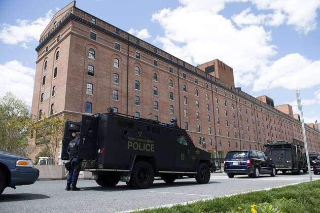 Members of the Prince George s County Police stage in a parking lot near Orioles Park in Camden Yards in Baltimore, Maryland on April 29, 2015. Protesters continue to march throughout Baltimore in the wake of Freddie Gray s death. The late 25-year-old died earlier this month from a spinal injury while in police custody.  BAL20150429324 KEVINxDIETSCH