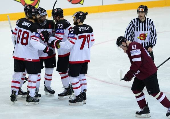 Canada players celebrate after scoring against Latvia during the Ice hockey Eishockey World Championship WM Weltmeisterschaft Group A match Canada vs Latvia in Prague, Czech Republic, May 1, 2015. (CTKxPhoto RomanxVondrous) CTKPhotoP201505010562101  vnd