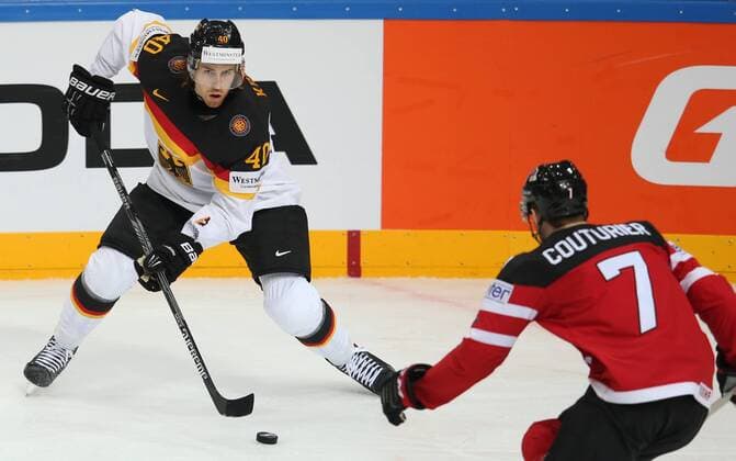 Ice hockey Eishockey - IIHF Ice Hockey WC 2015 PRAGUE,CZECH REPUBLIC,03.MAY.15 - ICE HOCKEY - IIHF World Ice Hockey Championships, international match Länderspiel Canada vs Germany. Image shows Bjorn Krupp (GER) and Sean Couturier (CAN). GEPAxpictures xAndreasxPranter 