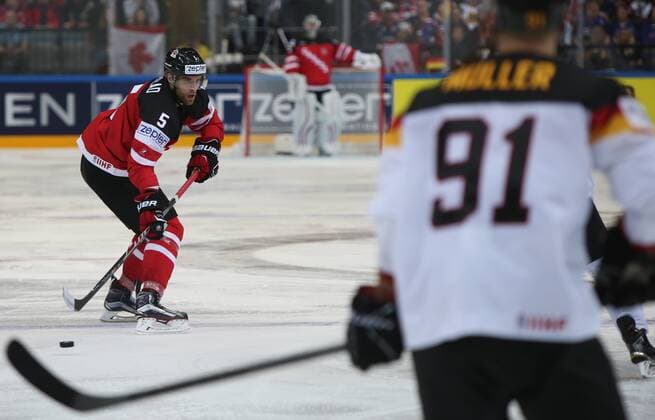 Ice hockey Eishockey - IIHF Ice Hockey WC 2015 PRAGUE,CZECH REPUBLIC,03.MAY.15 - ICE HOCKEY - IIHF World Ice Hockey Championships, international match Länderspiel Canada vs Germany. Image shows Aaron Ekblad (CAN) and Moritz Mueller (GER). GEPAxpictures xAndreasxPranter 