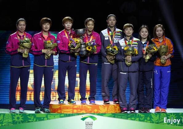 SUZHOU, CHINA - MAY 03: (CHINA OUT) (L-R) Li Xiaoxia and Ding Ning of China, Zhu Yuling and Liu Shiwen of China, Yu Mengyu and Feng Tianwei of Singapore, Li Qian of Poland and Li Jie of the Netherlands stand on the podium after women s doubles final match on day eight of the 2015 World Table tennis Tischtennis Championships at the Suzhou International Expo Center on May 3, 2015 in Suzhou, China.  CFP466952908 