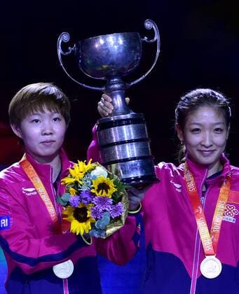 SUZHOU, CHINA - MAY 03: (CHINA OUT) Liu Shiwen and Zhu Yuling of China pose with their trophy after winning women s doubles final match against Ding Ning and Li Xiaoxia of China on day eight of the 2015 World Table tennis Tischtennis Championships at the Suzhou International Expo Center on May 3, 2015 in Suzhou, China.  CFP466952909 