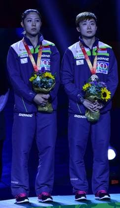 SUZHOU, CHINA - MAY 03: (CHINA OUT) Yu Mengyu (L) and Feng Tianwei of Singapore stand on the podium after women s doubles final match on day eight of the 2015 World Table tennis Tischtennis Championships at the Suzhou International Expo Center on May 3, 2015 in Suzhou, China.  CFP466952920 