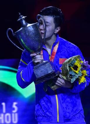 SUZHOU, CHINA - MAY 03: (CHINA OUT) Ma Long of China poses with his trophy after winning men s singles final match against Fang Bo of China on day eight of the 2015 World Table tennis Tischtennis Championships at the Suzhou International Expo Center on May 3, 2015 in Suzhou, China.  CFP466952943 