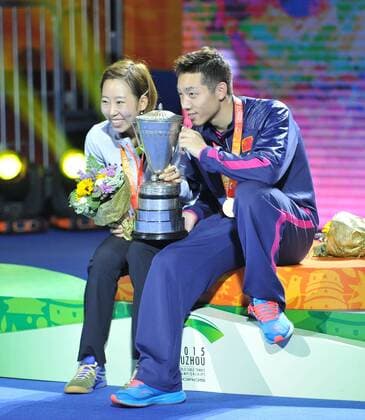 China s Xu Xin, right, and South Korea s Yang Ha-eun, left, pose with their champion trophy after defeating Japan s Maharu Yoshimura and Kasumi Ishikawa during the Mixed Doubles final match of the 2015 Table tennis Tischtennis World Championships in Suzhou city, east China s Jiangsu province, 1 May 2015. China s Xu Xin and Yang Ha-eun of South Korea have teamed up to become the first cross-border partnership to win the world mixed doubles table tennis championship for 61 years. The pair beat Japan s Kasumi Ishikawa and Maharu Yoshimura 4-0 at the world championships on Friday (1 May 2015), becoming the first mixed nationality winners of the title since Czechoslovakia s Ivan Andreadis and Hungarian Gizella Gervai at Wembley in 1954. Xu, Yang end six decade drought for cross border pairs  pbu267920_14