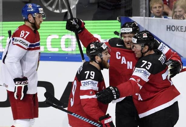 From left: Jakub Nakladal (CZE) and Ryan O Reilly, Sean Couturier and Tyler Toffoli (CAN) celebrate a goal during the Ice hockey Eishockey World Championship WM Weltmeisterschaft Group A match Czech Republic vs Canada in Prague, Czech Republic, May 4, 2015. (CTKxPhoto RomanxVondrous) CTKPhotoP201505040851801  vnd