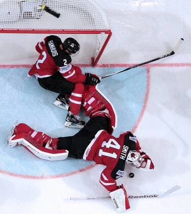 PRAGUE, CZECH REPUBLIC. MAY 4, 2015. Canada s goalie Mike Smith (front) and defenceman Dan Hamhuis in action in their 2015 IIHF World Championshiop Preliminary Round Group A Ice hockey Eishockey match against the Czech Republic at O2 Arena. The Canadian team won the game 6:3. Yelena Rusko TASS  TS001B23