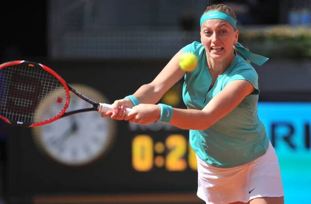 (150505) -- MADRID, May 5, 2015 -- Czech tennis player Petra Kvitova returns the ball against U.S. tennis player Coco Vandeweghe during day four of the Madrid Open tournament in Madrid, Spain, on May 5, 2015. Kvitova won 2-1. ) (SP)SPAIN-MADRID-TENNIS XiexHaining 