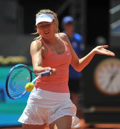 (150505) -- MADRID, May 5, 2015 -- Russian tennis player Maria Sharapova returns the ball against Mariana Duque-Marino of Colombia during day four of the Madrid Open tournament in Madrid, Spain, on May 5, 2015. Sharapova won 2-0. ) (SP)SPAIN-MADRID-TENNIS XiexHaining 
