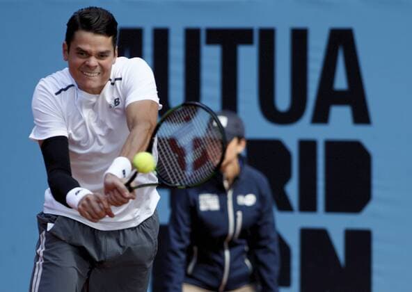 May 5, 2014 - Madrid, Spain - Spain, Madrid : Canadian tennis player Milos Raonic returns the ball to Argentinean tennis player Juan Monaco during the Madrid ATP Tennis Herren Masters Series Tournament tennis match, day 5 , on May 5, 2015 in Madrid Madrid Open Tennis 2015: Juan Monaco vs Milos Raonic  - ZUMAn230