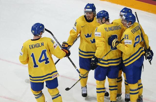 Ice hockey Eishockey - IIHF Ice Hockey WC 2015 PRAGUE,CZECH REPUBLIC,06.MAY.15 - ICE HOCKEY - IIHF World Ice Hockey Championships, international match Länderspiel Sweden vs Canada. Image shows the rejoicing of Mattias Ekholm, Anton Lander, Filip Forsberg and Loui Eriksson (SWE). GEPAxpictures xAndreasxPranter 